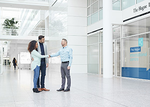 Personnel welcomes a couple to The Hague International Centre