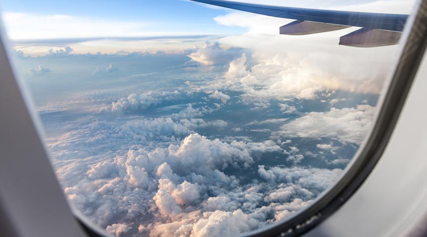 Sky view out of the window of a plane