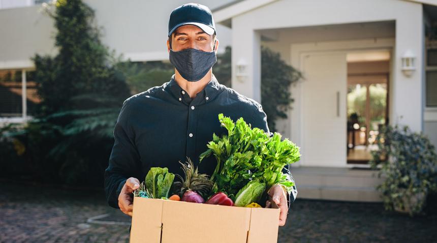 Delivery man with groceries