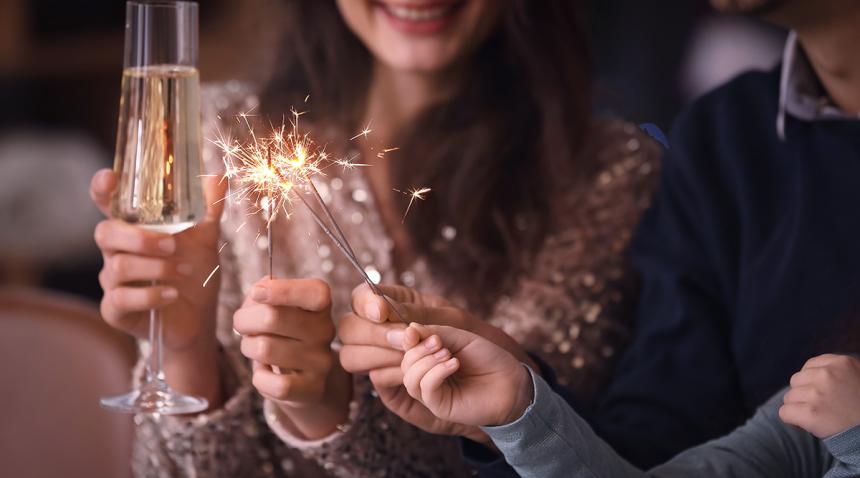 Champagne glass and fireworks