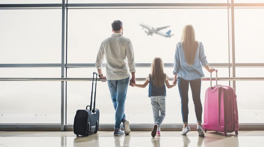 Family of 3 at the airport