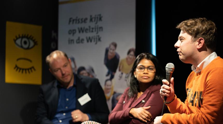 People speaking at an event