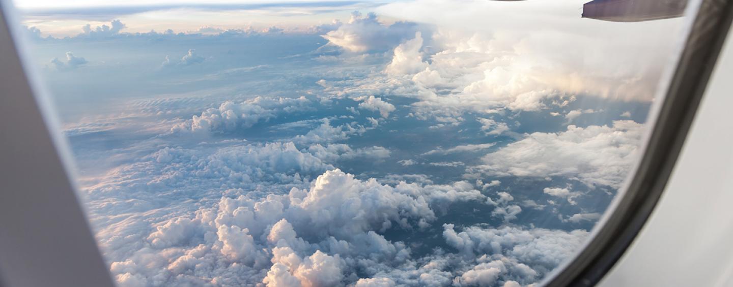 Sky view out of the window of a plane