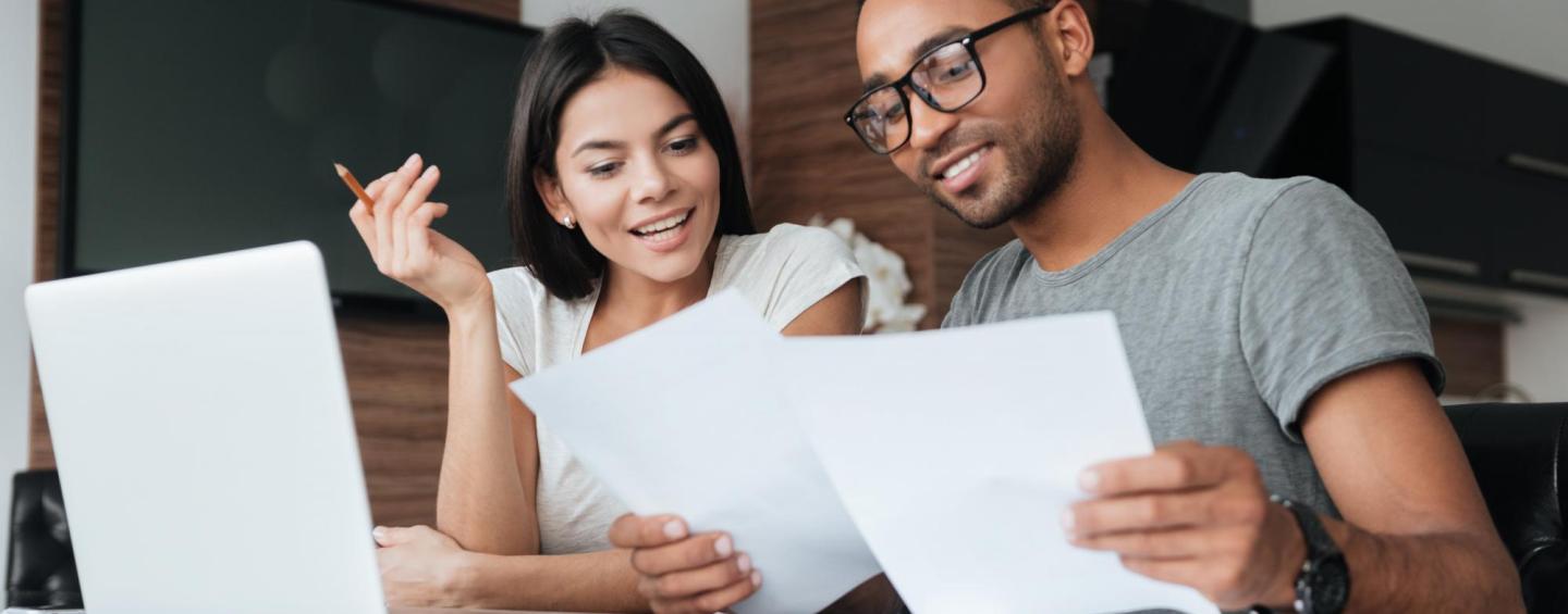 Couple sitting at the table arranging their finances