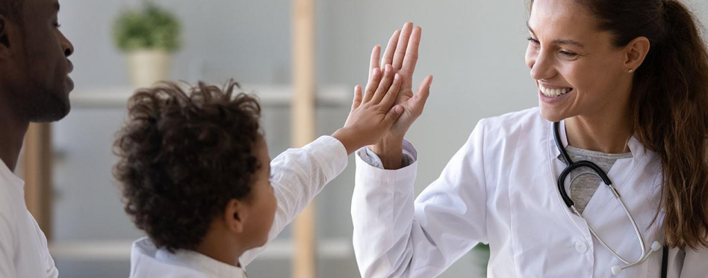 doctor child high five