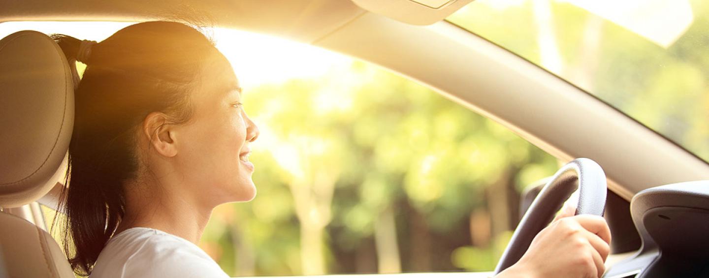 Woman driving a car.