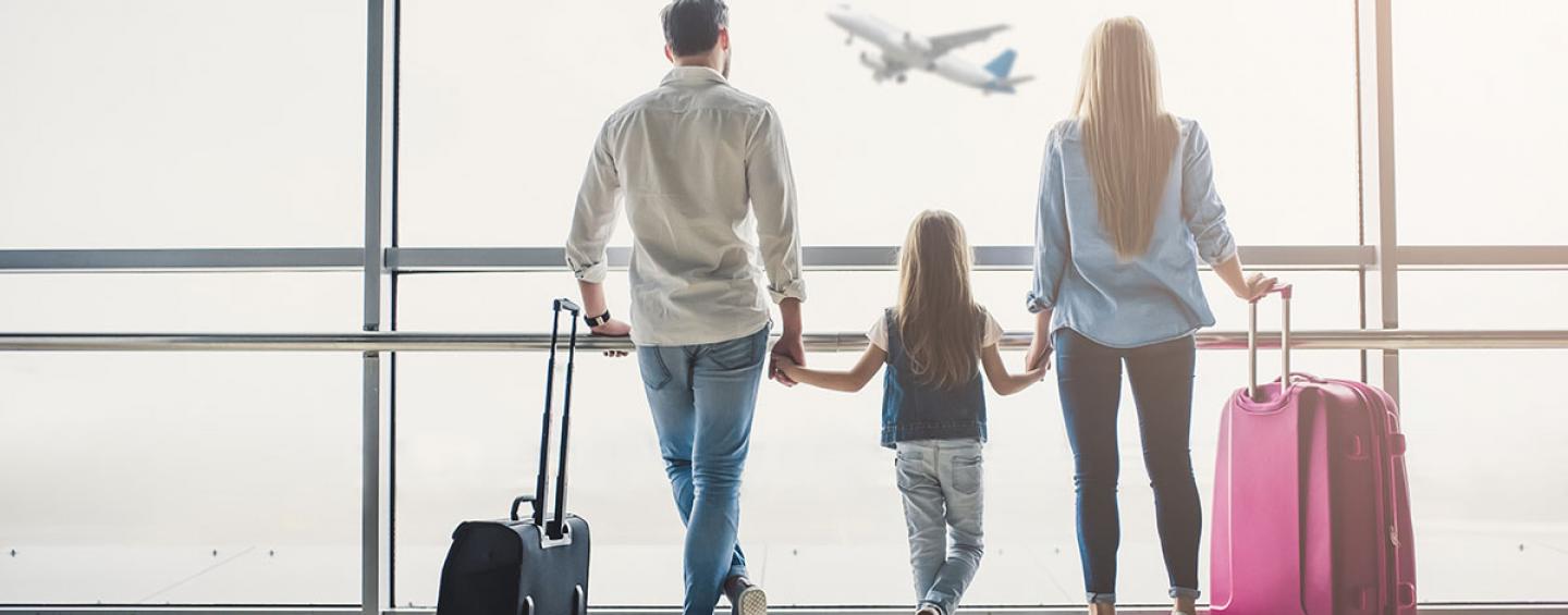 Family of 3 at the airport