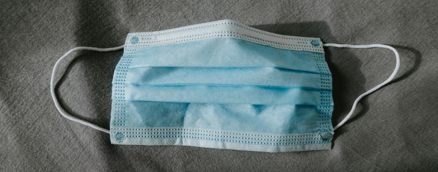 A blue medical face mask