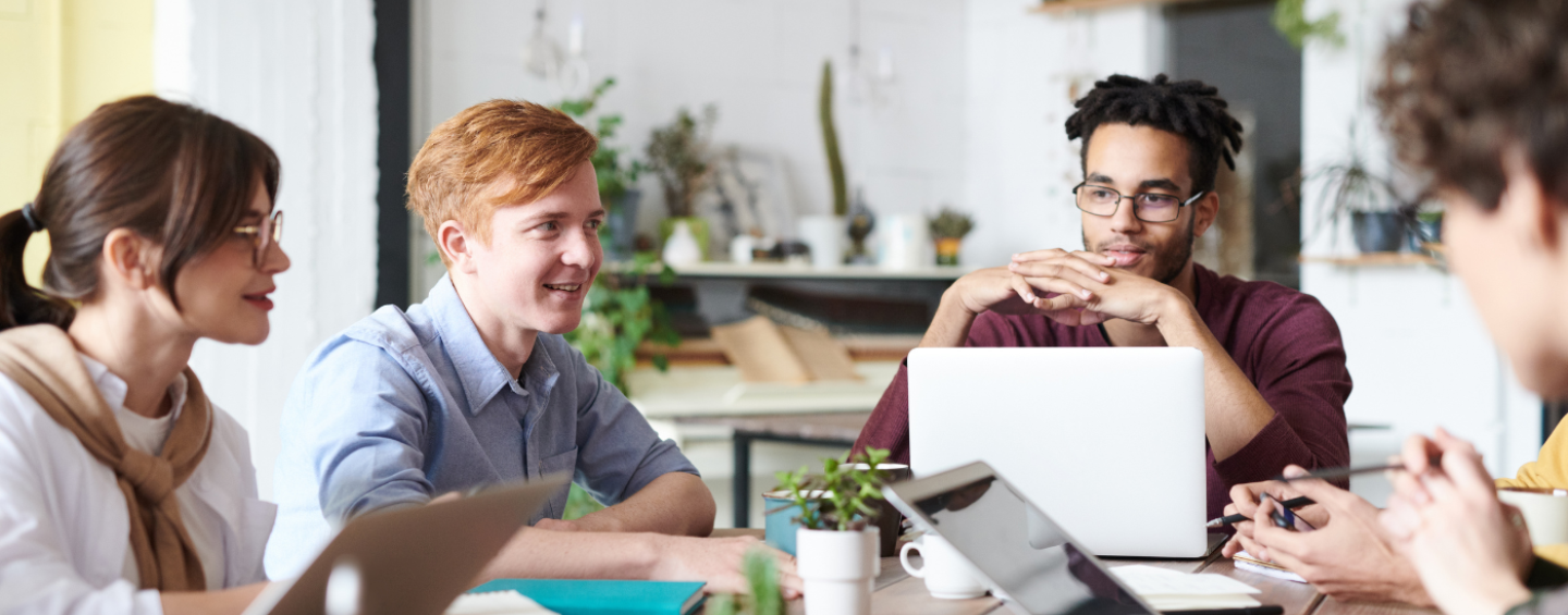 student around a table
